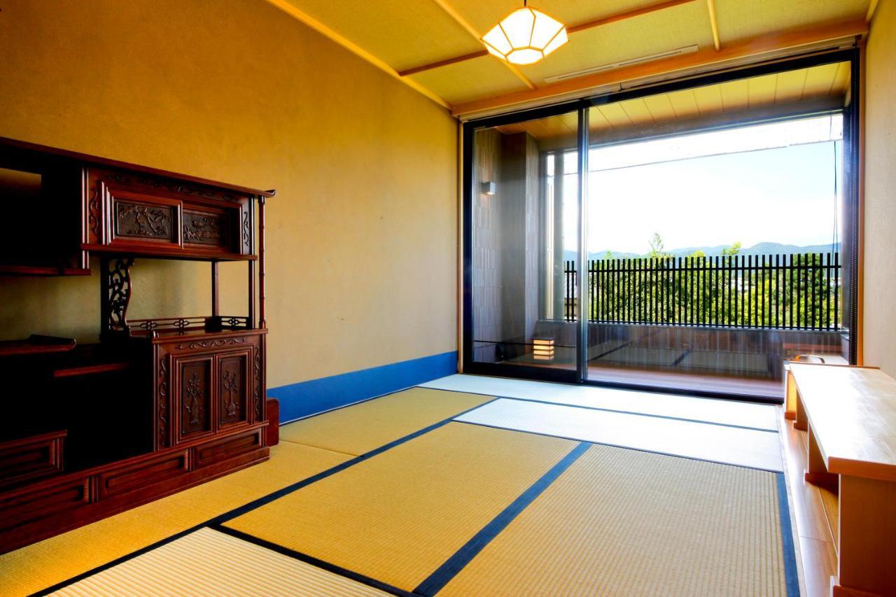 Kyoto Arashiyama Onsen Ryokan Togetsutei Esterno foto